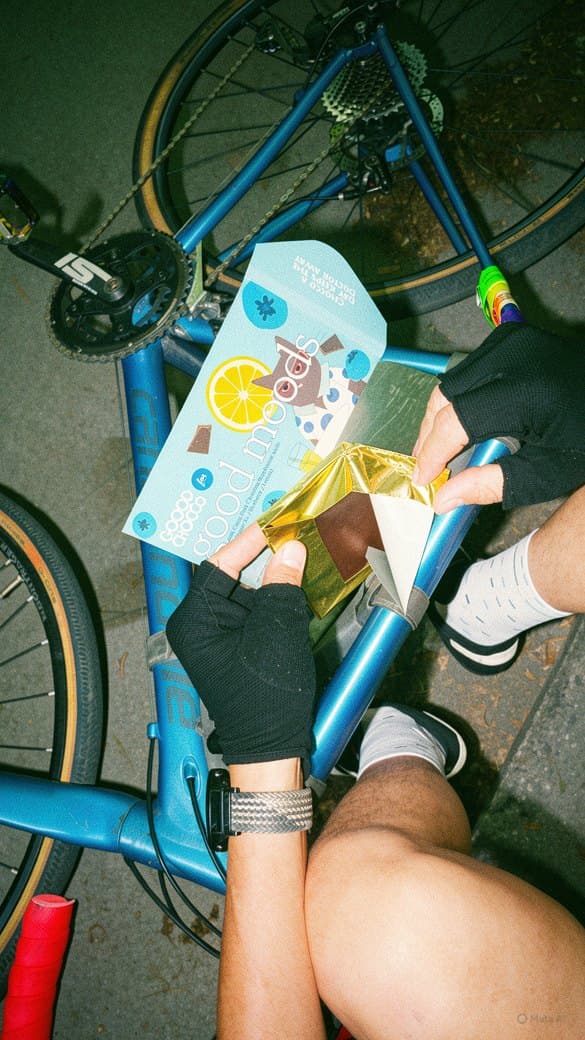 Unwrapping a Good Moods bar mid-ride